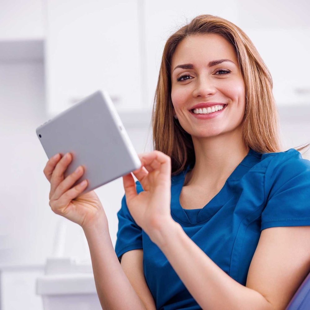 Doctor using tablet computer